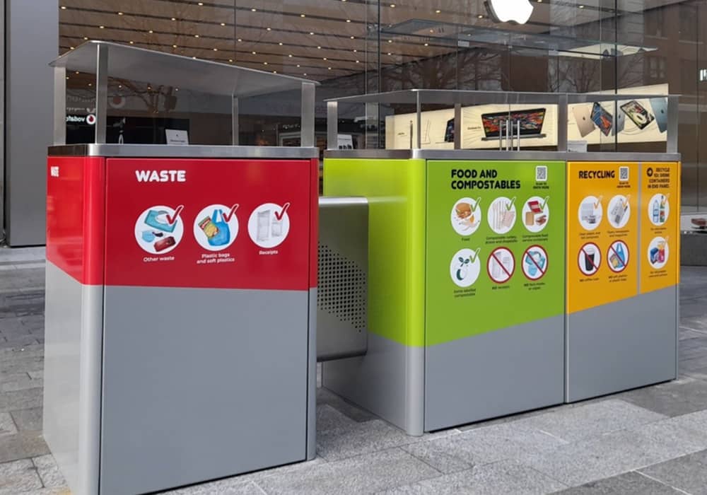 Three bins in Adelaide’s Rundle Mall, including a waste bin, food and compostable packaging bin and recycling bin